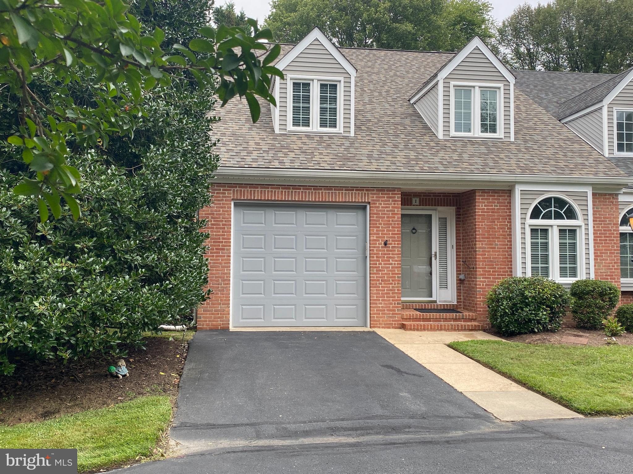Enjoy this easy, recently renovated town home located in Mallard Ridge on the south side of downtown Easton across from the YMCA at Washington Street. Perfect full time residence or lock and leave part time landing spot in beautiful Easton, Maryland. Mallard Ridge is a 20-unit condominium regime, and this is a coveted end unit with one car garage, driveway and additional parking available. The landlord pays the monthly condo dues, which cover yard care, trash service, snow removal, water and sewer service and all common area maintenance. The tenant is responsible for electric, cable/internet services, and rental content and liability insurance. Situated on a quiet cul-de-sac at the far end of the neighborhood which backs to a pristine wooded area, this two-story home has approximately 1920 square feet of living space including three bedrooms including a spacious bedroom on the first floor that can also be used as an office, playroom, or den. The first floor also has a full bath, an open family and dining room with a fireplace and hardwood flooring, a generous-sized totally updated eat-in kitchen with ample cabinetry and counter space, a rear sunroom with patio access, and laundry. The second floor has two large bedrooms with abundant closet space, a full bath, and a multi-purpose storage room. Recent renovations include a new roof, windows, exterior rear doors, a completely updated kitchen and first-floor full bath, and an encapsulated crawl space. All applications are processed through RentSpree; a separate application is required for every resident aged 18 and older. No smoking is allowed, and pets are considered on a case-by-case basis. Content and Liability insurance ($500,000 minimum) required. Available between Sept 1-7, tbd.