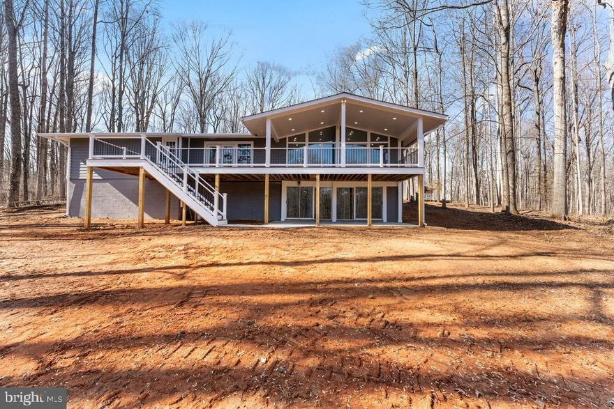 🌿 Modern Retreat on Private Wooded Acres 🏡✨

Escape to tranquility with this stunning, fully renovated home nestled on a private wooded lot with breathtaking views of nature and a serene pond right in your backyard.

💎 Key Features: ✔ 3 Bedrooms | 2.5 Bathrooms – Spacious and modern layout

✔ Gourmet Kitchen – Featuring sleek black granite countertops, white shaker cabinets, stainless steel appliances, and an oversized island perfect for entertaining
✔ Expansive Living Area – Vaulted ceilings, a cozy fireplace, and floor-to-ceiling panoramic windows offering stunning views
✔ Walkout Basement – Featuring a rustic stone fireplace, second living area, and direct access to the outdoors
✔ Massive Deck & Covered Patio – Enjoy outdoor living with a large wraparound deck and covered entertainment space
✔ Attached 2-Car Garage + Detached 2-Car Garage – Plenty of storage for vehicles, tools, or hobbies
✔ 5+ Acres of Pure Privacy – A true retreat with wooded surroundings and a private dock on the pond

This home is a rare find—offering a perfect balance of modern luxury and nature. Whether you’re looking for a peaceful escape or a home designed for entertaining, this one has it all! 🌲🏡✨

📍 Schedule your private tour today!