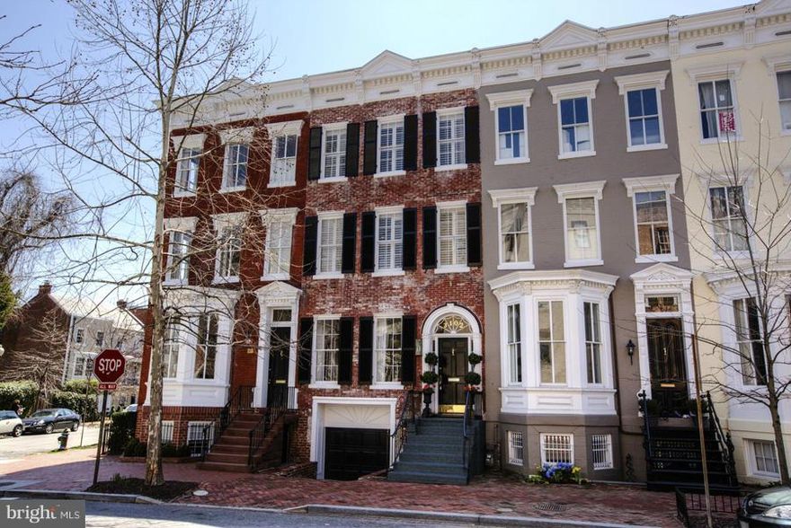 Gorgeous, light-filled 4 BR townhome with a GARAGE and stunning rooftop deck. Designer renovation features high-end finishes throughout. Large rear patio with fireplace and grill off of the dining room. Beautiful master suite with extensive closet spaces and en-suite master bathroom. Spacious lower level with storage, laundry, door to back patio and access to garage. CALL JAMIE PEVA FOR SHOWINGS.