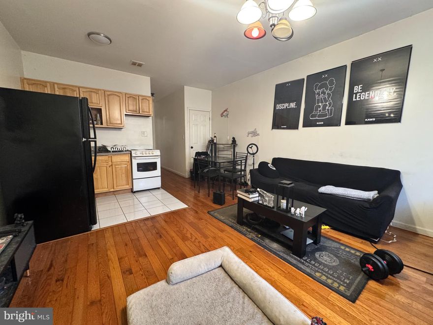 Fantastic duplex in Port Richmond! First floor unit has a private front entrance and opens up to a living and dining area with hardwood floors and tall ceilings throughout. The kitchen is tiled with wood cabinetry and electric stove. Down the hall you'll find a fully tiled bathroom and in the rear a spacious bedroom. The second floor unit has a private rear entrance off of the large back patio. Upstairs you'll find a living and dining area and with large front windows and a nice sized kitchen with similar finishes to the unit below. There is also hardwood floors and high ceilings. A tiled hall bath and two bedrooms sit in the rear of the home. Currently tenant occupied on month to month basis. 48 hours notice required for showings through the listing agent.