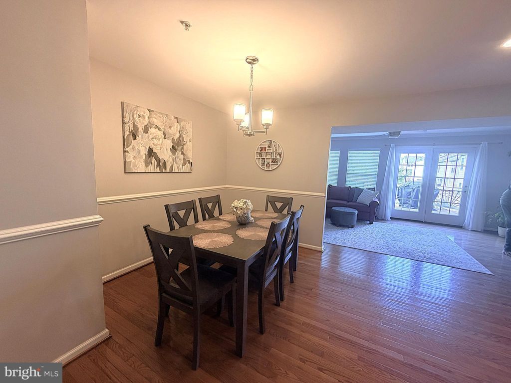 Photo of 7088 Maiden Point Place #25, ELKRIDGE, MD 21075 (MLS # MDHW2060142)