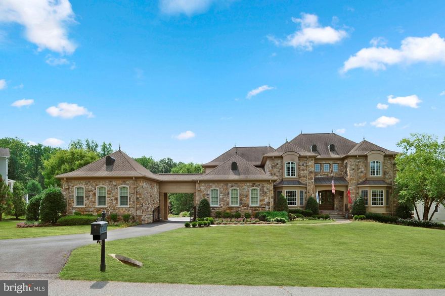 INCREDIBLE VALUE ! Originally built for $2.5M with an additional 500K in improvements, this stunning home would be impossible to replicate for its current listing price!  Experience this  magnificent custom built mediterranean estate with unsurpassed amenities minutes away from the quaint shops and restaurants of historic Ellicott city  and with convenient routes to Washington DC and Baltimore.  You will feel like you stepped into a resort with over 9000 sqft of luxury living that feels comfortable, inviting yet intimate. Meticulously maintained home with lush gardens, hardscape and large outdoor areas await your arrival to this stunning home. The variety of outdoor spaces in resort style setting offer unique places to sit, relax, and entertain your guests. (PLEASE WATCH VIRTUAL VIDEO) The interior features 5 oversized en suite bedrooms and 7 spa like bathrooms,  family room with wood beam ceiling, heated floors and built in speakers in every room,  elaborate moldings and paneling throughout , custom drapery, gourmet kitchen with solid wood custom cabinetry, all Viking appliances, hardwood floors , custom drapery , wood blinds all through the home, two staircases, large theatre room with projector and 135"movie screen, theatre lighting and speakers, exercise room with mirrored walls, pool changing closet and full pool bathroom, motorized screens on decks ,indoor sprinkler system, and smart enabled system to control  the whole house and countless more. The exterior features a fenced custom built in-ground mineral pool with separate hot tub, outdoor speakers, gas fireplace, pergola, dry sitting under deck, outdoor storage closet, custom landscaping and lights, a summer kitchen with built-in Lynx 42"grill, built in refrigerator, granite countertops, ceiling fans, outdoor speakers and mahogany ceiling. 2 attached and 2 detached car garages with gated driveway, garage tex storage system, MyQ link, irrigation system throughout. Complete luxury in an intimate setting , this home will surely provide countless days of joy and relaxation to its new  owners.  Please call today for a personal tour. APPOINTMENT REQUIRED WITH 24 HOUR NOTICE. NO DRIVE-INS PLEASE