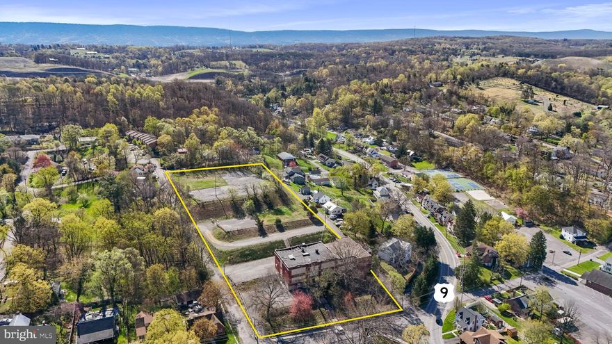 Price Reduced! Nestled within the Town of Bath Historic District, 187 S. Green Street presents an exceptional adaptive reuse opportunity for investors and developers. These 26,050 (+/-) square feet brick school building, originally constructed between 1918 and 1921 and expanded in 1956, sits on 3.2 (+/-) acres, offering ample space for redevelopment. With its solid historic construction, spacious layout, and potential for additional structures, this property is a rare opportunity to breathe new life into a landmark while benefiting from valuable incentives.