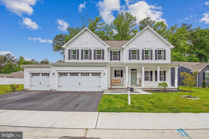 Looking for a like new home without the new construction stress & timelines??  Built in 2021 and located in the heart of Delmar, this home gives easy access to both Maryland and Delaware locations and checks ALL the boxes!!  This open concept home was built by Ryan Homes and features lots of unique upgrades you’ll be sure to love.  Upon entering, you’ll notice the beautiful Luxury Vinyl Plank flooring that flows from the foyer and continues throughout the first floor.  The home offers a neutral pallet with warm hues of beige & sage making decorating a breeze for new owners.  As you enter, immediately to your right you’ll find double glass French doors that open to your new home office.   You’ll love the open living concept highlighted by a generous living room with a lovely gas fireplace, a large, open kitchen with an island and a breakfast/dining area with built-ins.  The gorgeous kitchen features stainless steel appliances, ample cabinet space, quartz countertops, a beautiful backsplash with accents plus a pantry offering extra kitchen storage. The modern look of the kitchen is highlighted with crisp clean white cabinetry accented by a sage green kitchen island giving the space a soft and inviting focal point – the perfect spot to grab a quick bite before the day begins.  Just off the kitchen is the dining space with a built-in hutch/cabinetry – a convenient space to store extra kitchen wares and feature seasonal décor.  This is where you’ll also find double glass doors that lead to the lovely backyard.   Also, off the kitchen/dining space you’ll find a flex room and a conveniently located ½ bath along with the entrance to the oversized 3-car garage!!  On the second floor are all the bedrooms and the two additional full baths.  There are 3 amply sided bedrooms that share a full bath and the primary ensuite which features an oversized dual sink vanity, a beautiful glass shower and two spacious walk-in closets.  Moving outside you’ll surely enjoy the recently installed patio and fire pit area with custom pavers.  Imagine summer and fall evenings enjoying a glass of wine or cup of tea cozied up to the fire pit with your loved ones rehashing the day’s events or making plans for the weekend.  Last but not least, you’ll also enjoy the privacy afforded by the back wooded area/barrier between you and the neighbors.  This lovely home really does check all the boxes and is just waiting for YOU!  Schedule your appointment today before it’s GONE!