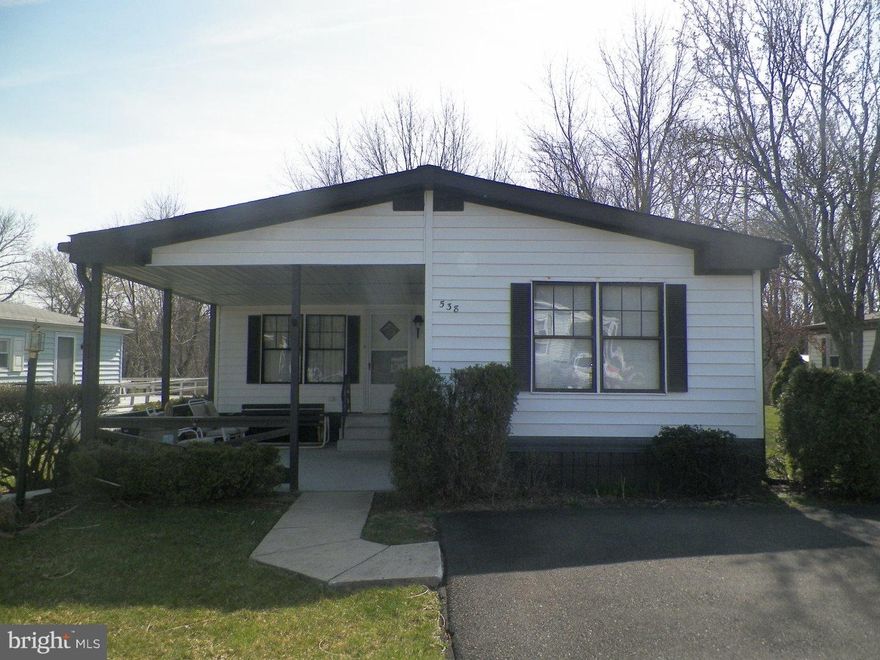Great Price for an attractive home/lot that has plenty of indoor and outdoor living space with a back door view to the woods!  Waste no time on this one, it will go fast... From the front covered patio to the back enclosed porch you will feel right at home.  Roomy bedrooms and baths at opposite ends of the home. This homes comes with a newer HVAC system 2014, Water Heater 2011, remodeled bathroom, newer gutters with leaf guards and a roof that is about 10 years old. Make your appointment now!