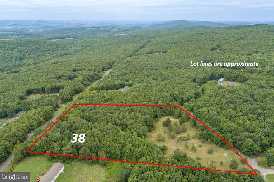 Wonderful mix of woods and open fields await you on this 4 acre building lot. Easily accessible yet private. This location offers close proximity to Interstate 68 and 219, but you will feel a world away in this quiet community. Great spot to build your own cabin in the woods or forever home.
