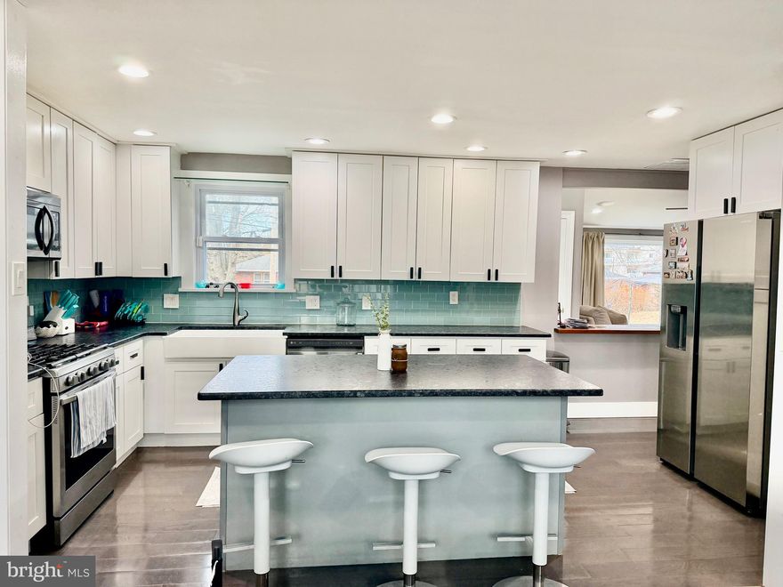 Welcome to this tastefully updated home offering 4 spacious bedrooms and 2.5 baths. The main level master suite features a walk-in bath with soaking tub and shower creating the perfect private retreat. Step upstairs where you will find 3 spacious bedrooms and a full bathroom. The open concept kitchen with a large island is perfect for family meals, entertainment and gathering together. Cozy up by the fireplace in the open concept living room for relaxing evenings. The finished basement offers flexible space ideal for game room, gym or home office. The large detached garage adds space for extra storage and convenience. With all major renovations and updates done in 2020, this home offers the space, layout, functionality and peace of mind you have been looking for!