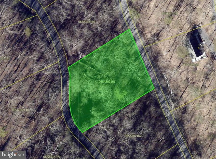 Have you been looking for a lot to build your dream home near the golf course? This wooded lot is  0.275 Acres. -  Walk to indoor swimming pool and fitness center in 5 minutes or take a stroll to the resort just minutes away. This property has dual street access on Lee Rd and Stonewall Drive - Resort offers the following: Airport, Library, Dog Park, Indoor Pool, Swimming Pool, Inground Outdoor Swimming Pool, Lazy River, Pickleball, Tennis, Playground, Golf, Lake, Mtn Biking, Skiing, Snowboarding, Ice-Skating Rink, to name a few. 1.5 hours from NoVA. Public water and sewer hook-up fee available through Stoney Creek Water and Sewer. Don't miss this one!