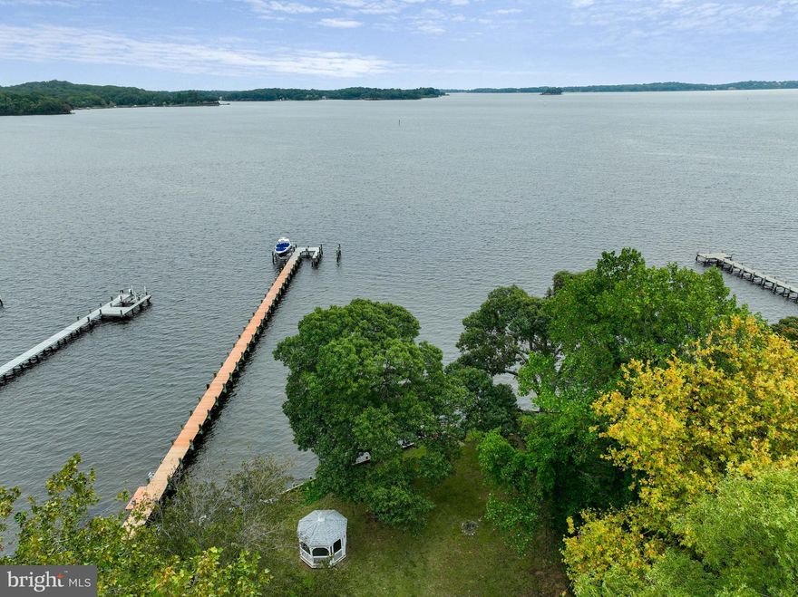 WATERFRONT.  New Construction with HUGE views. 5 bedroom, 5.5 bathroom, 65 ft of water frontage on the Magothy River. Permitting has started for the new home and pier. Still time to select finishes. Luxury Package includes all the expected high end finishes.  Tall Ceilings, walls of glass, Bosch Appliances, Hardie plank/shake siding, Kohler fixtures and quartz counters and backsplash. Optional Elevator.  Model Home available for buyers to walk.  Property has plenty of room for a swimming pool, sports court and an additional cottage. IDA zoning does not restrict lot coverage.  100% VA construction and other fantastic loan programs are available.  Go to WhitehallBuilding website for more information. Use this house plan or design your own with the builder.  Please do not enter driveway or property without a confirmed appointment.