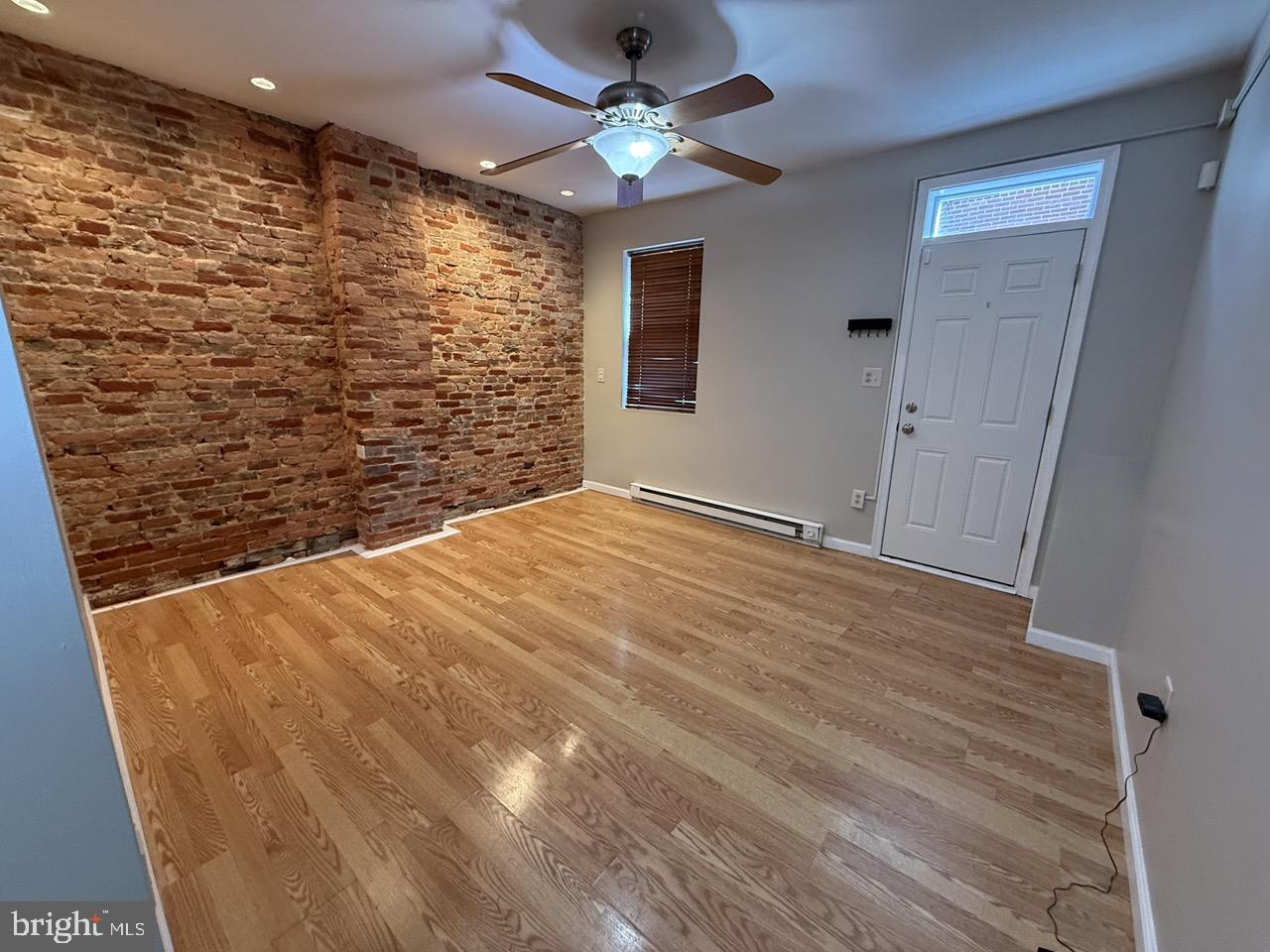 Charming 3-Bedroom Row Home Near Fells Point!
Welcome to this charming three-bedroom, two-bathroom row home, offering the perfect blend of comfort, convenience, and city charm. The walk-in level welcomes you with a living room with an exposed brick wall, leading to an eat-in kitchen with ample cabinet space. This level also includes a laundry/storage area, a full size bathroom and access to a cozy outdoor space, perfect for relaxing or entertaining.
On the second level, you will find two generously sized bedrooms, while the third level features a flexible office space, a third bedroom, and another full bathroom. Located just moments from Fells Point, this home offers easy access to restaurants, shopping, entertainment, parks, and playgrounds. Enjoy a short commute to downtown Baltimore, the Inner Harbor, and quick access to major highways and interstates. Don't miss out on this fantastic opportunity to rent in one of Baltimore's most vibrant neighborhoods!
Schedule your showing today!