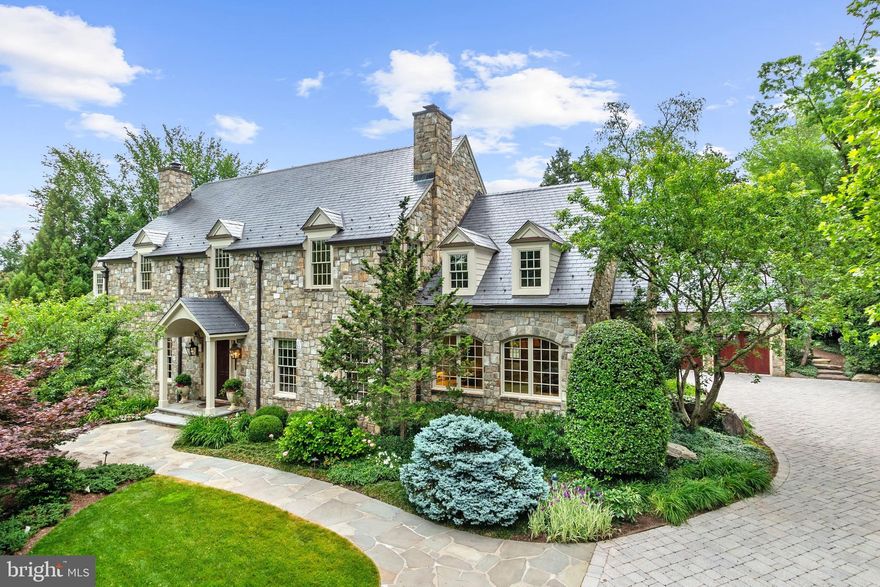 This architecturally detailed stone masterpiece is situated on almost .70 Acres the prestigious Langley Farms. Elegance and comfort reign in this spectacular home with 9,021 sq ft exceptional living and entertaining spaces that include a 2-story Foyer, Formal Living and Dining Rooms, Family Room that is adorned with a majestic stone fireplace, vaulted beamed ceiling and wall of windows and French Doors bring the outside in. Inviting Kitchen is custom-designed with maximum efficiency and style that include top of the line appliances, beautiful pendant lights and open to the Breakfast Room. Continuing on the Main Level are two handsome Offices perfect for remote work and school. The lavish Owner’s Suite has French doors that open to the Patio, two custom walk-in Closets, a fabulous Bath with double vanities, steam shower and towel warmer. A second Bedroom en Suite completes the Main Level. The Upper Level showcases two en Suites and a third home Office complete with a fireplace, built-in shelves and desk. The Lower Level retreat boasts a walk-out Recreation Room, Kitchenette, Fitness Room, Bedroom with Bath and Storage Room with built-in shelves. The expansive rear Patio has a built-in grill and pergola that is surrounded by professionally landscaped gardens with seasonal colors throughout the year. Wrap yourself in the beauty and convenience of this home that is minutes from Washington DC, Tyson and Downtown McLean. 
The sale of this property includes 1109 Harvey Lane (Tax ID: 0214 01 0041)