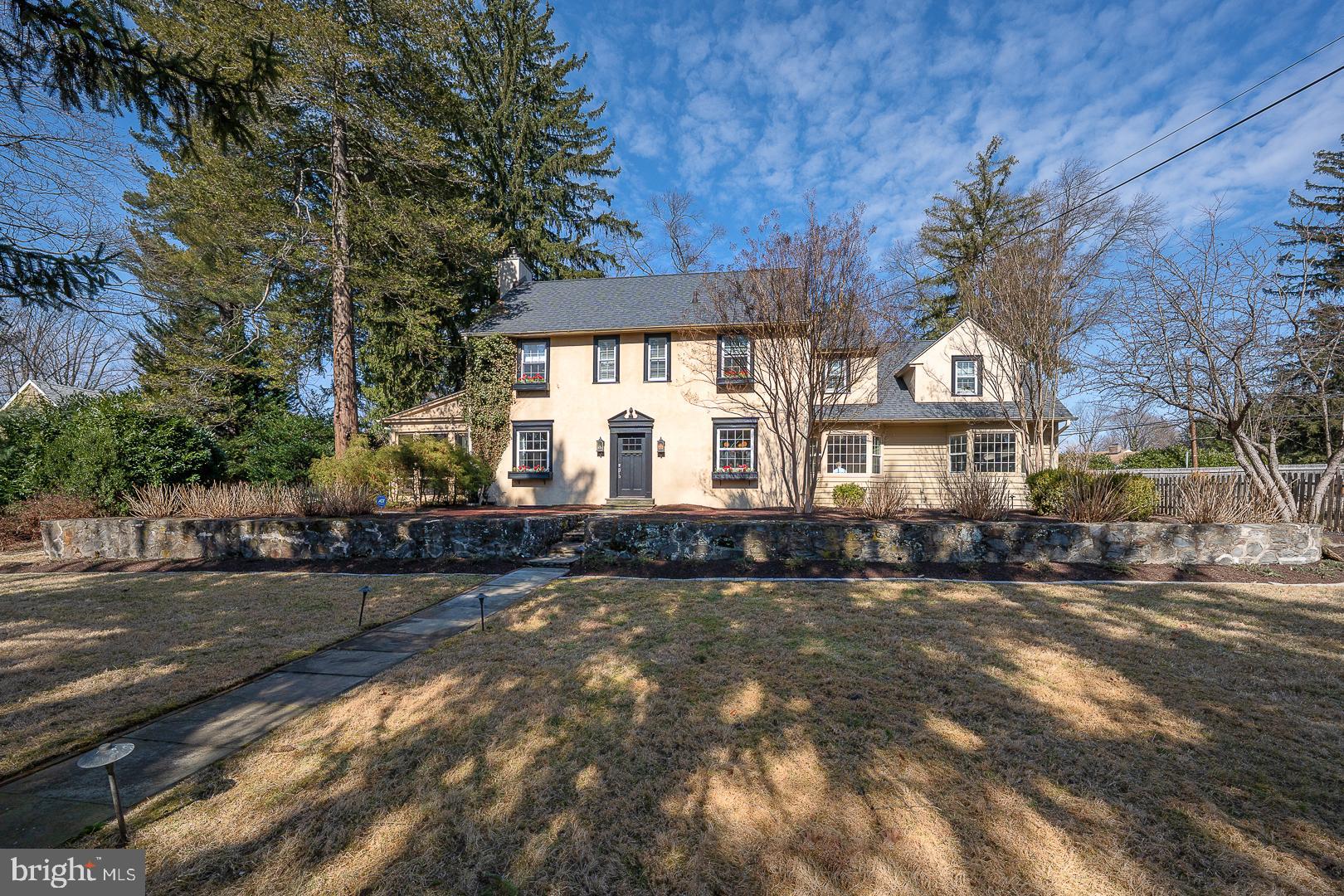 PLEASE SUBMIT ALL OFFERS BY 5PM, WEDNESDAY, APRIL, 2025!!
Nestled in the heart of Villanova, Pennsylvania, this classic 1930’s Main Line home embodies the elegance and charm of a bygone era. With its timeless architecture, exquisite craftsmanship, and rich history, this residence offers a glimpse into the lifestyle of the early 20th century. The home showcases the quintessential characteristics of Main Line architecture. The exterior features a well-balanced façade and plaster construction. East-facing windows enjoy the morning sun and flagstone pathways wind through low stone walled gardens to a brick courtyard welcoming you inside.
Upon entering, there are many earmarks of exquisite taste and current décor throughout the entire home. Rich hardwood floors and a crisp color palate blend with just enough themed wallpapers to catch the eye. A marble fireplace in the formal living room is framed by French doors that open onto a lovely screened porch viewing part of the private .7 acre lot. The dining room is perfect for hosting family get-togethers or fine dining as it opens to the gourmet kitchen flush with high-end appliances. The spacious family room contains a wall of custom cabinetry, high-clerestory windows, a cushioned bay window seat and beautiful powder room. Convenient backstairs are a tradition of the 1930’s era. Upstairs, are four generously sized bedrooms, 3 bathrooms and a laundry. The primary bedroom is ensuite with its renovated and rejuvenated bath, a sitting area and large walk-in closet. The second and third bedrooms share a large, renovated bathroom while the fourth bedroom is ensuite. The main staircase continues to the third floor adding potential for additional living space, including bathroom plumbing.
108 S Spring Mill Road offers ample outdoor space for relaxation and entertainment. The garden beds are full of annual hydrangeas and hostas, blooming flowers, mature trees, and well-kept lawns. Charming stone pathways, and a sparkling swimming pool provide the perfect backdrop for gatherings and leisurely afternoons. The detached 2-car garage provides a rear courtyard entrance and additional parking.
Villanova is renowned for its prestigious schools, including Villanova University, and its vibrant cultural scene. The Main Line area offers a plethora of dining, shopping, and recreational opportunities. Residents enjoy a serene suburban lifestyle with easy access to the bustling city of Philadelphia via the Septa regional rail, major highways and distinguished educational opportunities through many private or the #1 public Radnor School District.
SHOWINGS BEGIN AT OPEN HOUSE, 3/29 @1PM