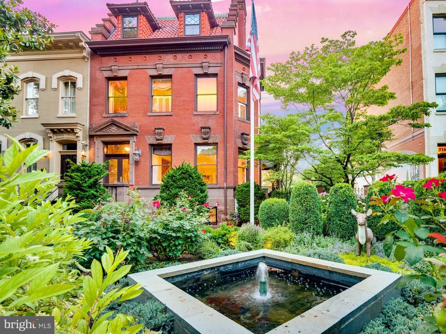 Open Sunday 5/16,  1-3PM. DRASTIC PRICE REDUCTION on this truly a "once in a lifetime opportunity!"  The iconic Deer House is considered by many to be the premier residence on Capitol Hill.  Its commanding presence on East Capitol Street, just seven blocks east of the US Capitol, captivates all who pass by.  Constructed for and by stone mason Antonio Malnati in 1903 by architect George S. Cooper, the majestic stone and brick facade features a sandstone entry stairway, front entrance with an ornate stone pediment, beautifully carved keystones and distinctive stepped-gable party walls.  The double-width lot allows a graceful (and rare) side porch and courtyard featuring a hand-painted mural that transforms the space into a veritable Garden of Eden.  The site of countless garden parties, weddings, fundraising events, Halloween extravaganzas and family dinners, this space is unrivaled on Capitol Hill.  A true "entertainer's dream," the Deer House is widely known for hosting events for 200+ people.  From the elegant entry hall to the spacious and bright living room, the exquisite chestnut-paneled dining room and the massive and beautifully functional kitchen, the home is tailor-made for gatherings large or small.  Five bedrooms and three bathrooms occupy the second and third floors.  The master bedroom suite features 2 walk-in closets and en-suite bathroom.  A large in-law suite with two bedrooms and one full bathroom occupies the terrace level with the possibility of significant rental income.  There is additional storage on this level for the main house including a walk-in wine cellar.  The detached two car heated garage includes a utility sink and abundant storage for bikes and garden tools.  The private driveway can accommodate an additional two cars.  Beautifully renovated and impeccably maintained by its current owner, the Deer House is an architectural masterpiece awaiting the next chapter in its storied history.   View the main house 3D tour here (https://my.matterport.com/show/?m=kwSCHL8z7a3&brand=0)