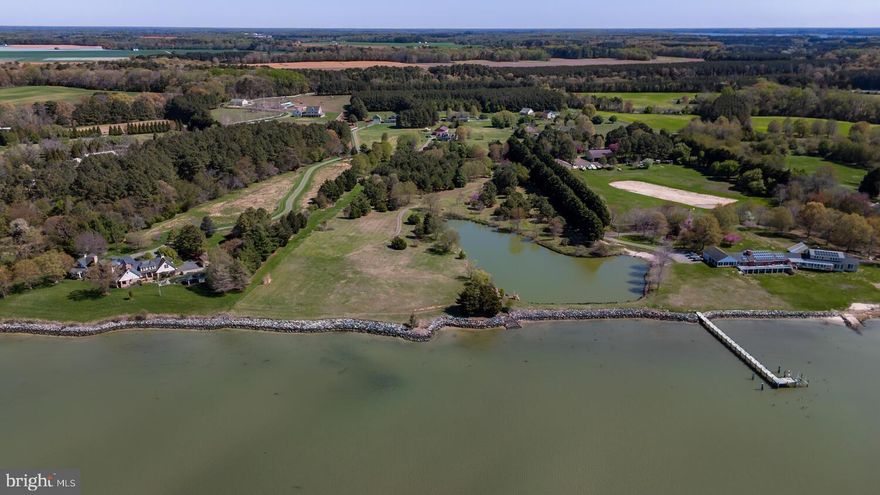 Set along the broad waters of the Choptank River, this remarkable 10.88± acre waterfront property in Talbot County offers an uncommon blend of scale, privacy, and panoramic open-water views. With approximately 600± feet of rip-rapped shoreline, the setting provides both protection and an impressive stretch of river frontage rarely available today.

A current approval for a 6-bedroom residence allows for the creation of a substantial custom home tailored to your vision. Importantly, the property is not located in a flood zone, so flood insurance is not required—a meaningful advantage for long-term ownership and design flexibility.

The wide river exposure captures expansive vistas, steady breezes, and ever-changing light across the water. Boating, sailing, and fishing are easily enjoyed from this stretch of the Choptank, with convenient access to the Chesapeake Bay and nearby waterfront towns such as Oxford and Cambridge.

Beyond the river frontage, a scenic 2.5-acre pond enhances the landscape and creates opportunities for thoughtful estate planning. With nearly eleven acres, there is ample room for a guest house, pool, gardens, or additional outbuildings (subject to county approval), allowing the property to evolve into a true Eastern Shore compound.

Private yet convenient to Easton and Route 50, this offering represents a rare opportunity to secure significant waterfront acreage in one of Maryland’s most sought-after coastal regions.
