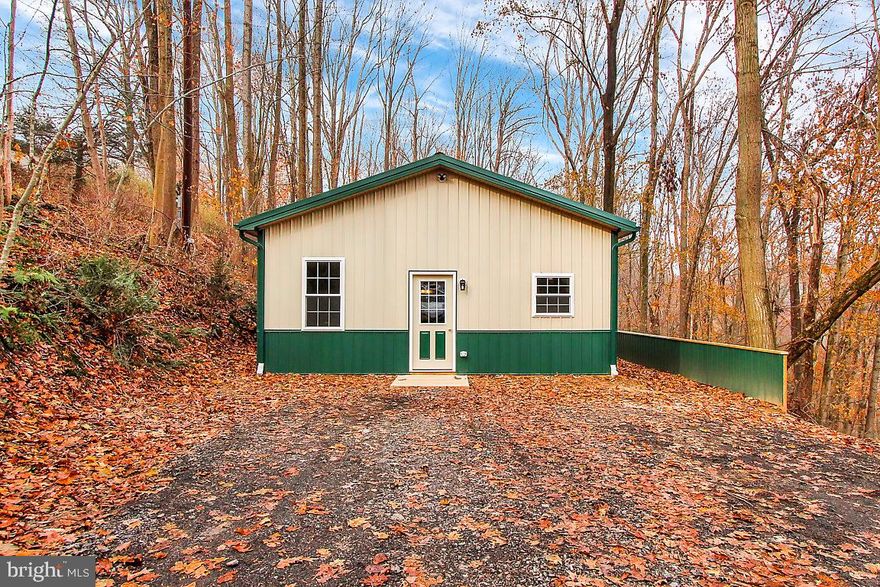 Brand new 3 BR 1 bath rancher- great starter home or weekend retreat. Home has 10 foot ceilings, ceramic throughout, and solid core doors.  Private lot with view of Muddy Creek stream. Very open floor plan with 42" cabinets and all appliances included.  High efficiency home and seller can add some finishing options at a very reasonable cost - kitchen island, outside shed, etc.