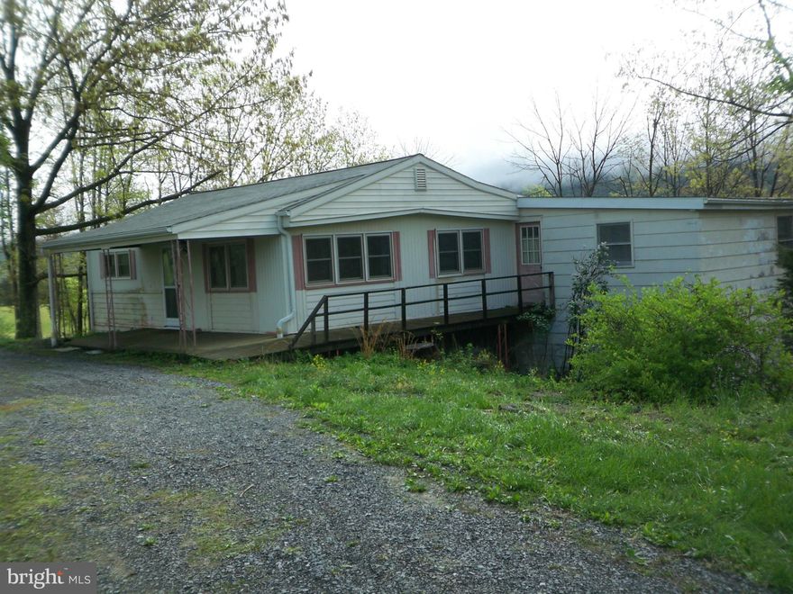 OWNER FINANCING!  Large double wide with built on additions. Beautiful Sleepy Mountain view.  On an unrestricted, private, cleared and wooded 2 acre lot. 3 bedrooms and 2 full baths, with additional finished rooms in the basement, kitchen, dining room and living room.  This is one house you won't grow out of!