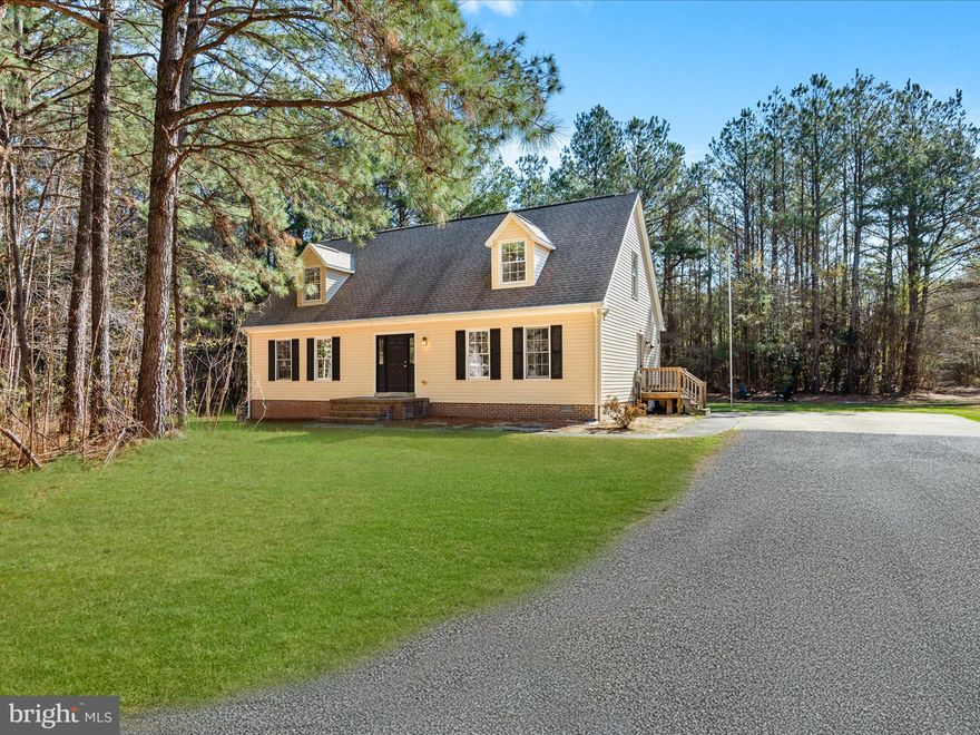 Welcome to 9273 Whitesville Road, Parsonsburg, Maryland – a charming retreat nestled on a picturesque 1.¾-acre park-like setting. Thoughtfully updated and beautifully maintained, this home feels fresh and inviting—ready for you to move right in and make it your own. All brand-new paint, flooring, appliances, cabinets and lighting. With four bedrooms, three full bathrooms, and generous living spaces, it offers the perfect blend of comfort, function, and style. Step inside to discover luxury vinyl plank flooring flowing throughout the main level, paired with a soothing, neutral color palette that brings warmth and cohesion to every room. The heart of the home is the light-filled kitchen, featuring butcher block countertops, stainless steel appliances, and a spacious dining area ideal for everyday meals or casual entertaining. The main-level primary suite is a peaceful retreat with an en-suite bath and walk-in closet. An additional bedroom, full hall bath, and a convenient laundry center complete the first floor. Upstairs, you'll find two spacious dormer-style bedrooms—each with its own unique character—along with a third full bath and a versatile bonus area, perfect for a home office, creative studio, or reading nook. Step outside to your elevated back deck overlooking a tree-lined yard—an ideal setting for your morning coffee or an evening cookout with family and friends. Don’t miss the opportunity to experience this delightful home—where every detail has been thoughtfully designed for modern living. Come see it today and make it yours!