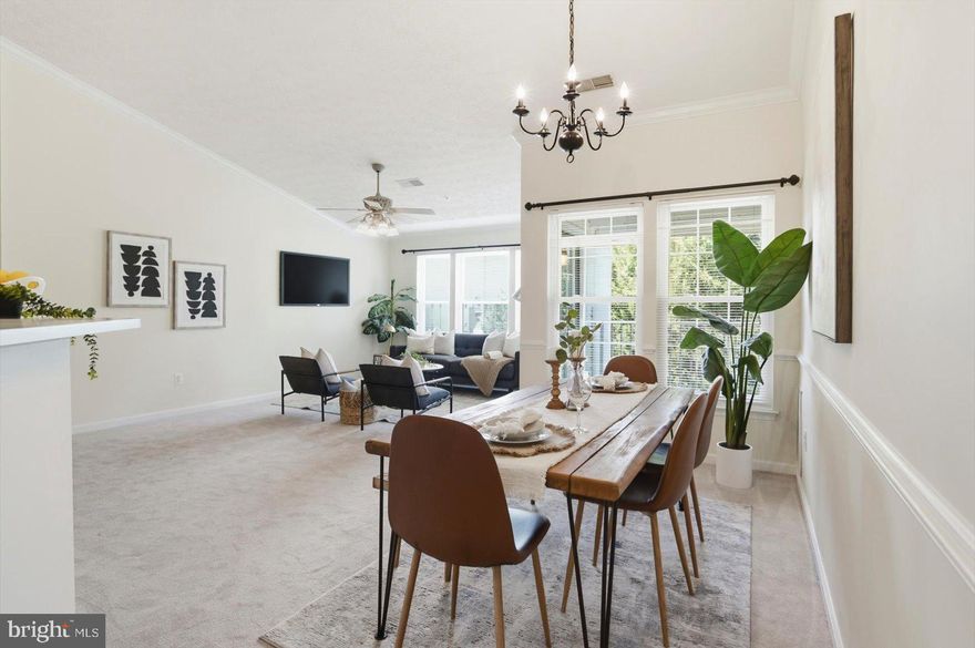 Penthouse living in the highly sought-after Perry Hall Farms! This top-floor condo, accessible by elevator, showcases soaring vaulted ceilings and an abundance of natural light that fills the space with warmth and openness. Offering 2 bedrooms and 2 full baths, the thoughtfully designed layout features an airy living room with expansive windows and direct access to a private balcony—perfect for morning coffee or evening relaxation.

The spacious primary suite is a true retreat, complete with vaulted ceilings, a large walk-in closet, and a well-appointed en-suite bath featuring a walk-in shower. A generously sized second bedroom and full bath provide flexibility for guests, a home office, or additional living space.

Enjoy the convenience of in-unit laundry, ample interior storage, and a secure, well-maintained building with intercom entry. Ample parking adds to the ease of everyday living.

Ideally situated just minutes from shopping, restaurants, parks, and everyday conveniences, with quick access to major commuter routes, this home offers the perfect blend of low-maintenance living and accessibility. A rare opportunity for top-floor comfort in a desirable community!