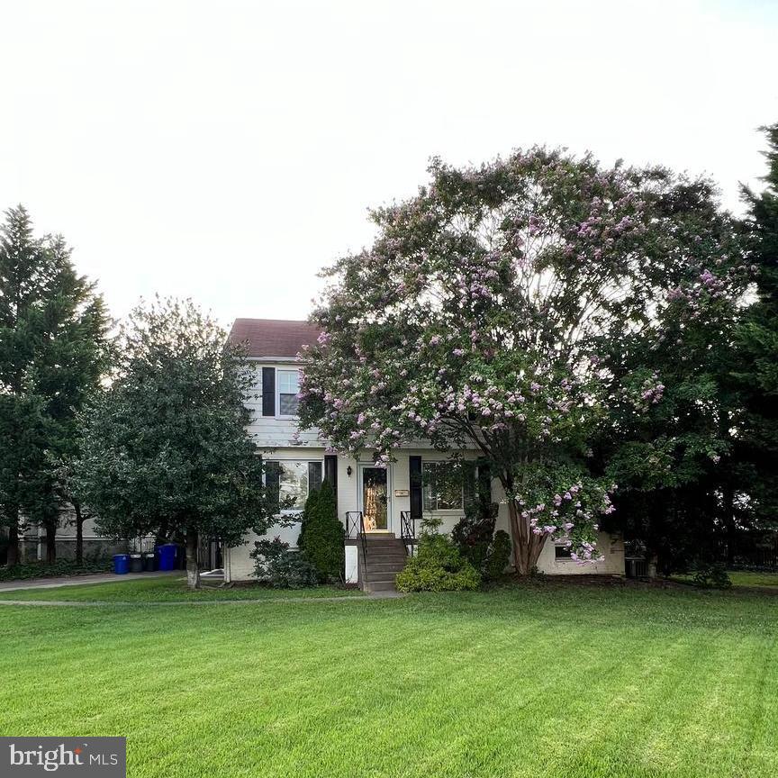Welcome to this charming 5-bedroom, 2.5-bath colonial located in the highly desirable Wyngate subdivision. The home features beautiful hardwood floors throughout and a private backyard perfect for relaxing or entertaining. A unique highlight is the second kitchen and additional living area, ideal for guests, extended family, or added flexibility. Conveniently located minutes from vibrant Downtown Bethesda and Pike and Rose with abundant dining and shopping options. Close proximity to the Metro, Washington, D.C., and major commuter routes including I-270 and I-495.