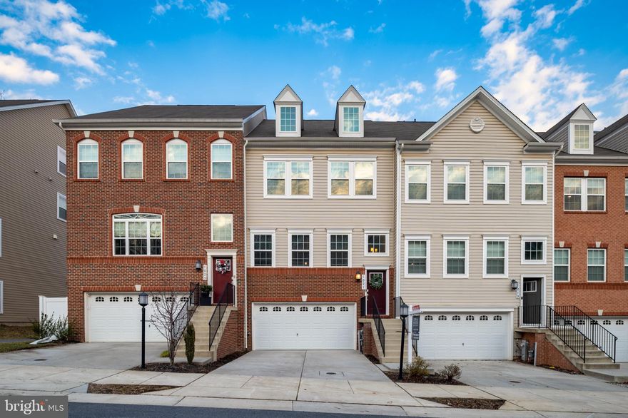 Wow!! Luxurious 4 levels, rooftop deck, 2 car garage townhome!!  This stunning Ellicott model by Lennar in sought after Summerfield Village!!  One of a kind, quality, elegance and living space galore!!   Thousands of dollars in upgrades--premium gourmet kitchen featuring an amazing oversized center island, a butler's pantry, stainless steel appliances, gas cooking, wall ovens, complemented with quartz counter tops, white kitchen cabinets, huge pantry and dining area leading to a deck, perfect for morning coffee or outside dining!  Split foyer entry leading to sunny light filled living room! The lower level is complete with family room, full bath and slider to the backyard (premium lot) backing to open space, tot lot, walking/bike path, dog park and the community clubhouse, ideal for families with teens and small children. The upper level primary bedroom suite with luxury bath, upgraded custom design closet in 2nd bedroom, and don't miss the upper 4th level living space with spacious 2nd family room, half bath and a private rooftop patio for relaxing or entertaining guests... and what a view!!! Plus, gorgeous flooring, neutral colors and all current popular trends such as a smart home app to remotely control HVAC dual thermostats, garage door, exterior door locks, expoxy floor and storage closet in garage and more!  This home is conveniently located to schools, Waugh Chapel Town Center, restaurants, movie theater, Fort Meade, Marc train and routes 301/32/50 making easy access to D.C., Baltimore and Annapolis.  Take time to explore this lovely home and imagine the lifestyle available for the new owner!! Hurry won't last truly one of a kind!!