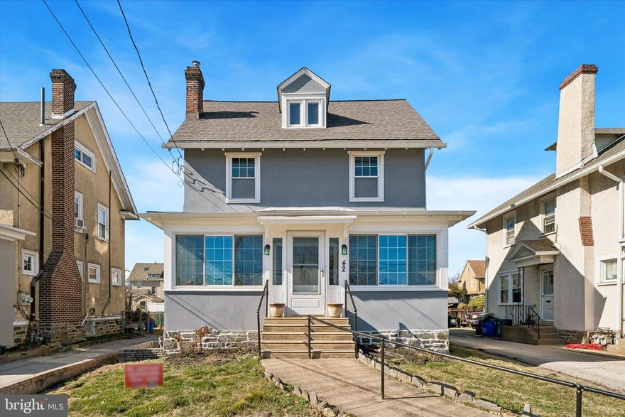 Welcome to 42 Brookline Blvd! Character and charm are found throughout this thoughtfully updated home in the heart of Havertown. Just steps from local shops, restaurants, and public transportation, this home is a must-see for anyone seeking a walkable lifestyle. Enter through the bright Sunroom and immediately notice the beautiful hardwood flooring that extends throughout the first floor, along with charming architectural details. The Living Room features a cozy gas fireplace and crown molding and flows into a versatile center Sitting Room that provides access to the Powder Room, laundry room with sliding barn door, and a convenient side entrance. The formal Dining Room, highlighted by a bay window and elegant moldings, offers the perfect setting for both entertaining and everyday meals. The updated Kitchen is a chef’s dream with abundant counter space, ample cabinetry, and stainless steel appliances. A bright Breakfast room, with a ceiling fan and access to the unique two-sided center staircase, completes the main level. The second floor features a spacious Primary Suite with generous closet space, a Sitting Room, Bonus Room, and a Full Bathroom with a stall shower. Two additional sizable Bedrooms are also found on this level, one featuring a decorative fireplace and built-ins, along with a large Full Hall Bathroom with a tub/shower combination. The third floor offers a fantastic Flex Space with vaulted ceilings, along with a fourth Bedroom and Full Bathroom with a stall shower. Additional storage can be found in the unfinished Basement and the detached two-car garage with Loft space. If you’re searching for a home that blends thoughtful updates with original character, in a highly walkable Havertown location, look no further than 42 Brookline Blvd.