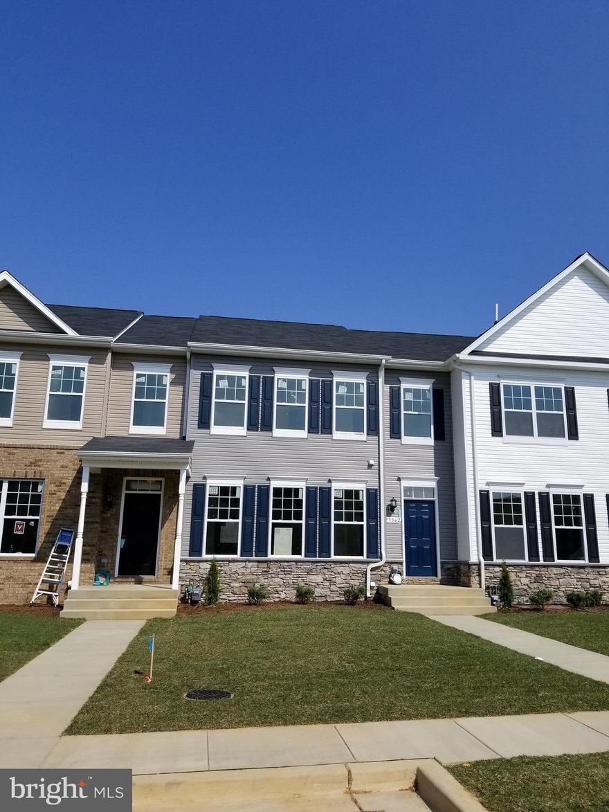 IMMEDIATE DELIVERY! Brand New Townhome! W/$10,000 CLOSING! "Compton" Rear Kitchen Model,  2-Car Rear Load Garage, Hardwood at 1st floor, Stainless Steel Appliances,Granite Counters, Gas Cooking, Gas Heat, Tankless Water Heater. Finished Rec/ room & Full bath in basement, Community Amenities feature: Clubhouse, Pool, Basketball & Tennis Courts, Playground.