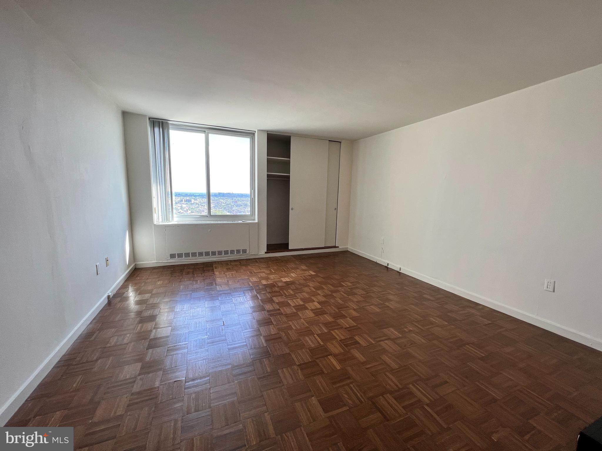 Bright and cheery studio on a high floor of The Hopkinson House! This home features parquet wood floors throughout, excellent closet space, oversized windows, an open kitchen with white cabinetry and white appliances, and a full hall bathroom with a single vanity and shower/tub. Residents of Hopkinson House enjoy a 24-hour doorman and on-site management. There is a seasonal rooftop pool with see-forever city views and valet parking in the building for an additional fee. Hopkinson House is located on the center of Washington Square, steps from world class dining, shopping and historic sites.
