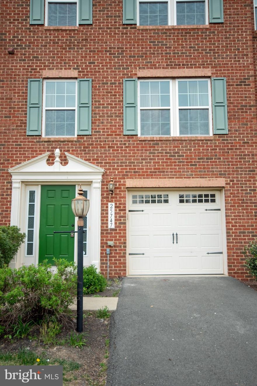 Ready to move in and you will fall in love with this charming brick front townhouse with fresh paint throughout the entire interior and brand new laminate flooring throughout.  3 large spacious bedrooms, 2 full  and 2  half bathrooms with bright open floor plan on the main living level.  Basement is converted into the room and can be used as a 4th bedroom if needed. Gorgeous, expansive trex deck and fully fenced backyard provide perfect spaces for retreat or for entertaining guests. Garage with direct access to the home's Foyer.  Great location, minutes from major roads and local amenities. Please call or text Listing agent for more question. Pets are case by case basis only