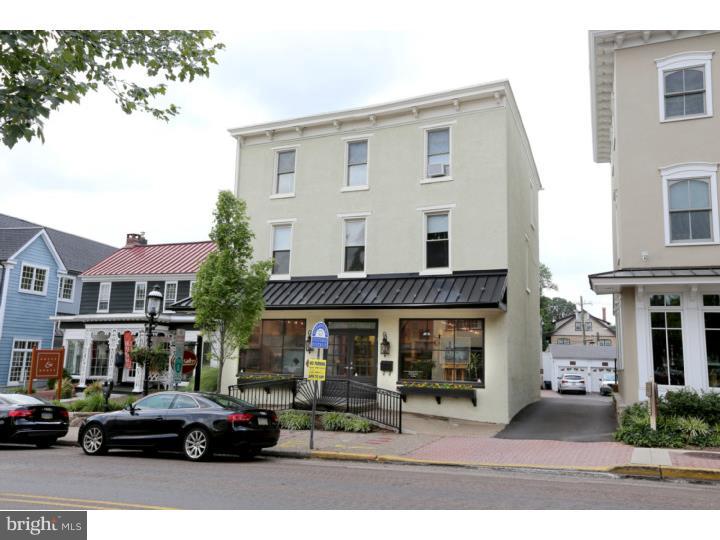 3 apartments (fully occupied) and one street-level commercial space (currently listed for lease) in a fully renovated downtown Doylestown building with plenty of off-street parking. Apartment income currently generates $36,900/year, the commercial tenant is stepping aside for a new owner/user/investor. Hardwood floors, high ceilings, large windows and historic touches offer classic borough style. The first floor commercial space's center partition wall is removable, offering a nearly clear span of 41' x 28', plus a separate office, storage, and kitchenette room. The apartments are one bedroom each except for the top floor (2 bedroom). New HVAC mini-split systems throughout the entire building. Full basement for storage, off-street parking for about 6 cars (each apartment gets one parking space), tenant utilities separately metered except for water/sewer and common hot-water. Newer roof, soffits, fascia capping, gutters, windows, etc. Bring your own commercial use and off-set your costs with the rental income, or install a commercial tenant and collect all the rents.