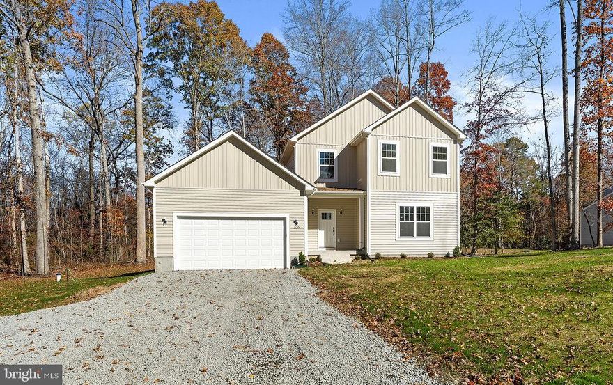 Welcome to The Leland — a beautifully crafted 4-bedroom, 2.5-bath home with an attached two-car garage, perfectly blending modern comfort with timeless style. The open-concept main level centers around a bright and inviting living room that seamlessly connects to the dining area and gourmet kitchen, creating the ideal setting for both entertaining and everyday living.

The kitchen is a true showstopper, showcasing a large center island, gleaming quartz countertops, and designer finishes that combine elegance with functionality. Upstairs, four spacious bedrooms offer room for everyone to unwind, including a private primary suite complete with a walk-in closet and spa-inspired ensuite bath. Thoughtfully designed throughout, The Leland offers the perfect balance of comfort, convenience, and room to grow.

Located in The Waters at Lake Anna, residents enjoy an exceptional lake lifestyle with exclusive community amenities—including a private pool, clubhouse, tennis courts, playground, and a sandy beach with a private boat launch. Need a slip for the day? The HOA has you covered. This golf-cart-friendly community sits on the peaceful private side of Lake Anna, just minutes from local wineries, breweries, and waterfront dining—everything you need to make lake life feel like a permanent vacation.