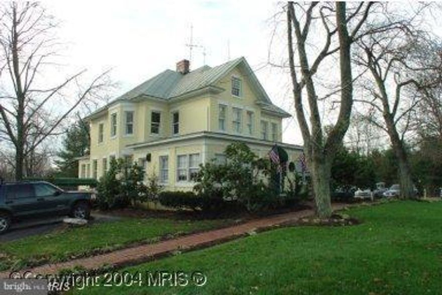 REDUCED PRICE !!! The interior was beautifully restored  and converted to upscale office suites. It is a harmonious blend of old and new architectural elements. The upper level has a current lease (month to month, renewable) Additionally, there is a 1,727 sq. ft. cottage adjacent to the main building. Use may remain as office suite w/ rental income or restore back to a lovely upscale Restaurant.