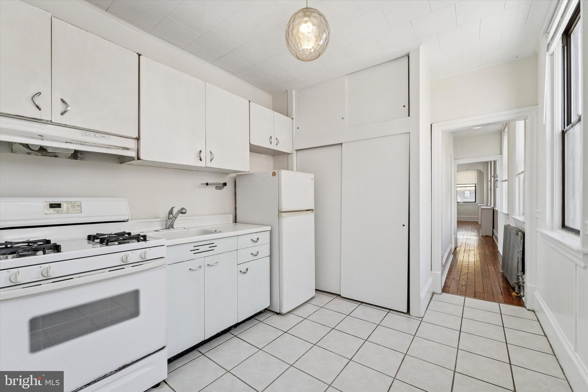 Great apartment on the top floor of this triplex! Enjoy the eat-in vintage kitchen and tons of natural light flooding the unit through 11 large windows! Art deco tiled bath, and hardwood floors in the living room and bedroom. Shared laundry in basement. Across from the Italian Market, steps away from Igro's Pastries, the Bart's Bagles, Mawn, Fiorella Pasta, Tabachoy, Anthony's Coffee, etc - nothing will be too far away ever again! Ditch your car and take advantage of the best South Philadelphia has to offer. Only a 15 minute walk into Center City!
Tenant responsible for gas, electric, and water. First, and 2 month security. Minimum 600 credit score. Tenant screening includes financial, criminal, rental, and work history.
First months rent due at signing. No smoking. 600 minimum credit score.
Landlord is a licensed real estate agent. $30 for water & $14 for trash monthly