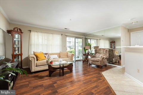 Photo of 11000 Kinship Court #101, MANASSAS, VA 20109 (MLS # VAPW2116170)