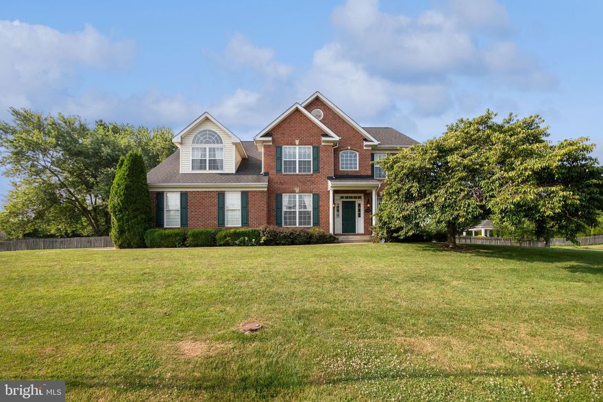 Remarkable Green Hill Manor colonial situated on flat 0.88 acre private lot. Almost 5,000 sq ft!! Enjoy peaceful Adamstown area while in great commuter location.  Walking distance to school and park. As you enter the property, you are greeted by the grand 2 story foyer. Main level features a formal office, living and dining room as well as a gorgeous gourmet kitchen with ample countertop and cabinet space, stainless steel appliances, granite countertops, and oversized island.  Spacious family room off the kitchen with fireplace. Bonus sunroom off kitchen perfect for table space, toy room, or lounge.  The backyard oasis offers many areas to escape  between the relaxing screened-in porch, the huge deck, the playground, the garden, the section of shaded trees perfect to hang a hammock, and the expansive fenced-in yard space! The upper level features 4 spacious bedrooms. The ginormous master bedroom features a sitting area, two walk-in closets, and super bath with double vanity, soaking tub, and walk-in shower. One of the master closets is HUGE with custom shelving - perfect for dressing room, craft room, or extra office! One of the spare bedrooms has private en suite perfect for older child, in-law, or au pair. The unfinished basement offers ample space for storage and home gym.  2 car garage. Laundry room off garage and kitchen.  Immaculately maintained and move-in ready! *SHED NOT INCLUDED*