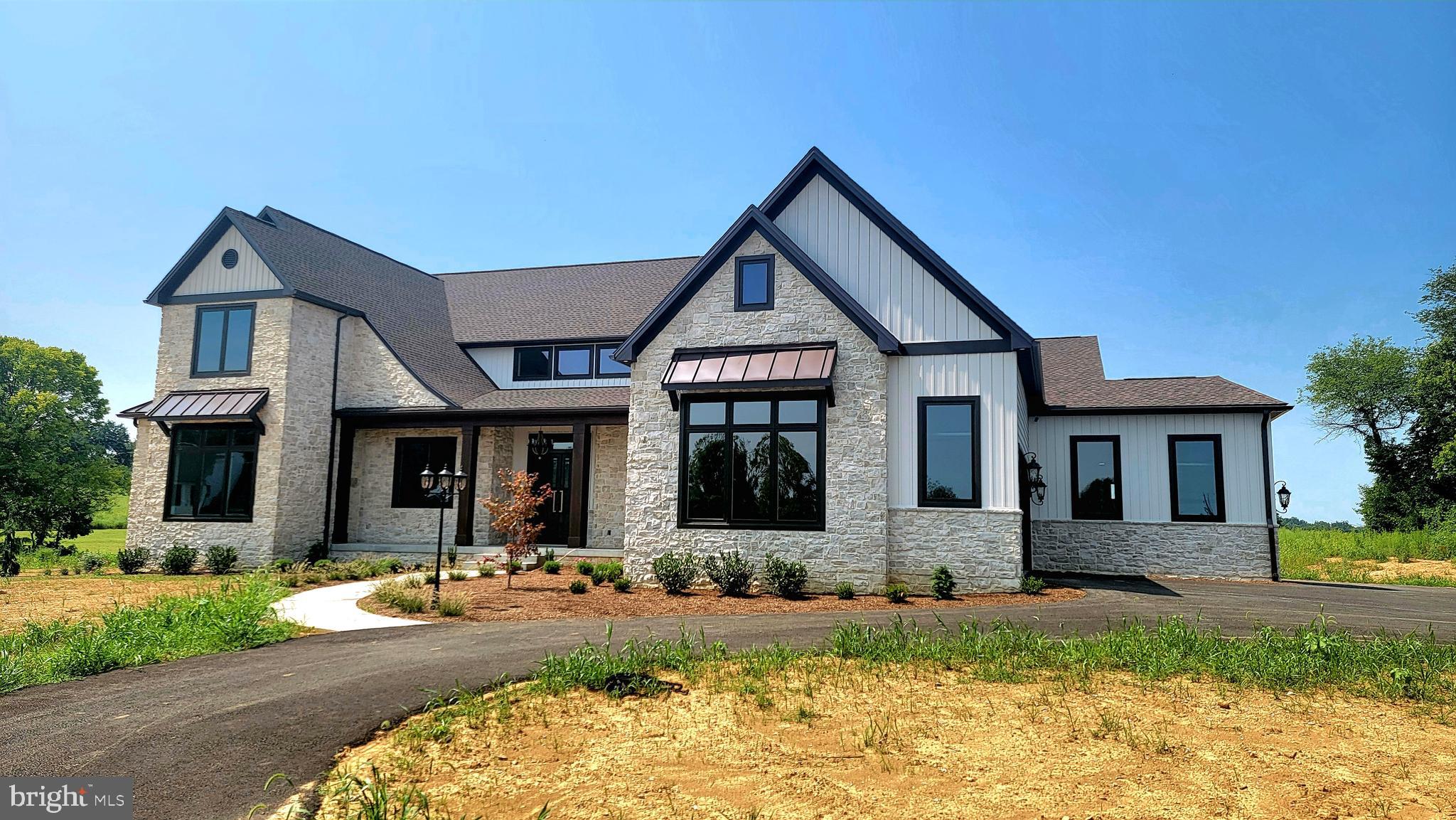 Comp purposes Meriweather Fields. Custom luxury level home. Great room, custom built ins, 2nd prep kitchen and pantry, Finished basement with media room and kitchenette. Rear patio with private rear views.