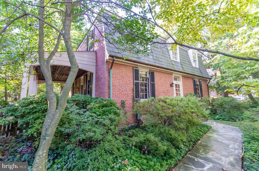 Great New Price on this detached home with large fenced yard. Living room, dining room, kitchen with breakfast room, bedroom #5 and laundry on main level with full bath plus 4 bedrooms, 2 baths on 2nd level. Enjoy the idyllic, sylvan setting of this larger than usual lushly landscaped yard from the covered side porch. Easy access from rear to driveway and 2 car garage. Charm and character abounds.