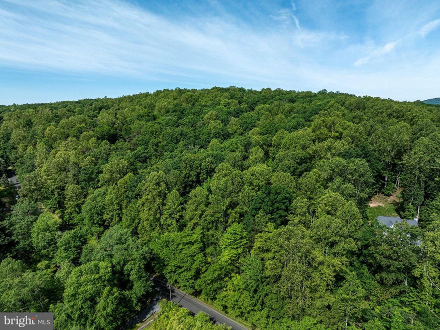 Wonderful and private 6.69 acre lot just minutes to I-66 and Historic Marshall. Build your dream home on this beautiful treed lot!  Previously perc for 3 bedroom. Electric and cable at the street, and a 40 ft. cleared area to pull into, convenient to town and major commuter routes yet you can still enjoy the peace and quiet of country life!