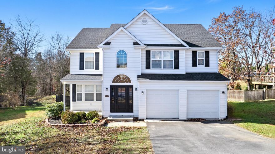 Welcome to this beautifully maintained home, thoughtfully updated and full of desirable features! As you enter, you’re greeted by vaulted ceilings and a versatile flex space that can serve as a playroom or office and includes a ceiling fan. Just around the corner is the updated half bathroom, followed by the stylish kitchen that was renovated in 2024 with quartz countertops, a deep double-bowl sink, modern cabinetry, and stainless steel appliances. The kitchen flows into the dining area, which leads into the expansive living room complete with Luxury Vinyl Plank flooring and an electric fireplace. From the dining space, step out onto the updated deck, perfect for outdoor dining and entertaining with the added convenience of an awning. Back inside, the garage can be accessed from the main level and includes added cabinets for extra storage and an additional refrigerator. Upstairs, you’ll find carpeted bedrooms including a spacious primary suite with two closets and a large private bathroom featuring a soaking tub, separate shower with an oversized shower head, and a private water closet. A dual-entry bathroom connects two additional bedrooms, with one featuring a custom closet system. All bedrooms are complete with ceiling fans. A hallway closet and laundry room add even more storage and functionality on this level. With thoughtful upgrades and stylish finishes throughout, this home is truly move-in ready and offers comfort, convenience, and modern style in every room.