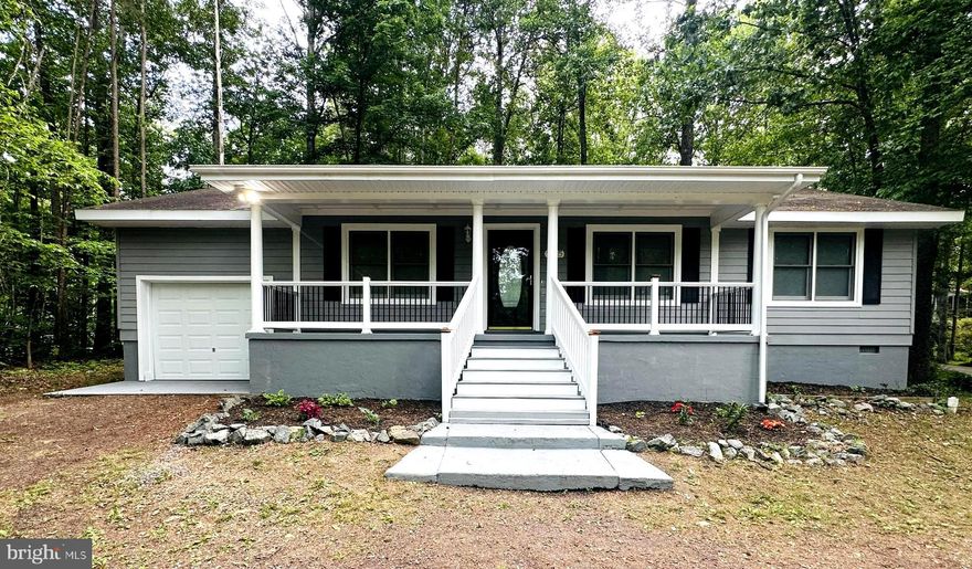 Welcome to this beautifully updated 3-bedroom, 2-bath home located at 105 Beachside Cove in the sought-after gated community of Lake of the Woods. Perfectly situated on a spacious corner lot just three blocks from the lakeside beach, this home offers the ideal blend of comfort, style, and resort-style living.

Step inside to an inviting open floor plan featuring bright living spaces, modern updates, and seamless flow for everyday living and entertaining. The charming front porch creates a warm welcome and the perfect spot for morning coffee or evening conversations. Out back, enjoy a beautifully covered rear deck designed for relaxing, grilling, or hosting friends and family year-round.

Whether you're looking for a full-time residence or a weekend retreat, this property offers easy access to the lake, beaches, amenities, and all the lifestyle benefits of living in Lake of the Woods.

Property Highlights:

Beautifully updated 3-bedroom, 2-bath home
Spacious corner lot
Open-concept floor plan
Large welcoming front porch
Covered rear deck ideal for relaxing and entertaining
Just 3 blocks from the lakeside beach
Located in the gated Lake of the Woods community

Enjoy lake living at its best in this move-in ready home!