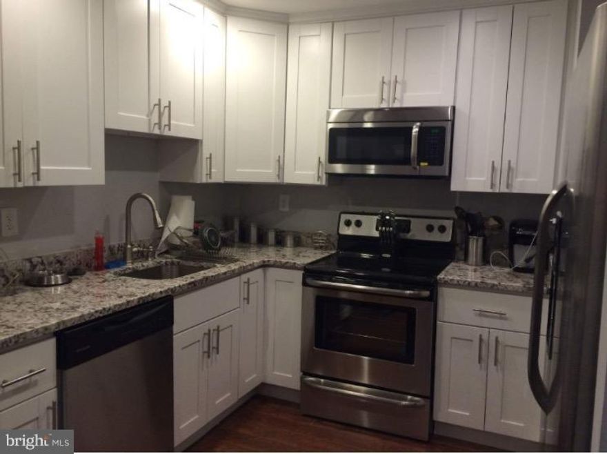 Beautifully remodeled (2015) and available now.  Updates galore!  Kitchen has 42" cabinets, granite counter tops, ss appliances, custom ceramic tile bath. Recessed lighting, carpet, freshly painted (gray), ceramic flooring, windows.  The list of upgrades can go on & on!