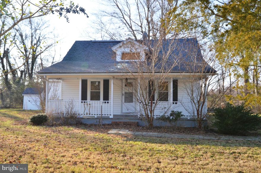 ATTENTION INVESTORS!   *** CONTRACT FELL THRU - BANK HAS APPROVED $80K SHORT SALE PRICE ON 7-1-15 ***    Cape Cod with front porch on a lovely .85 acre lot. Garage/ workshop with power, carport. Large parking area. Mature trees. HOME SEVERELY DAMAGED BY FIRE, BEING SOLD STRICTLY AS IS. ENTER PROPERTY AT OWN RISK. Estate sale. Potential short sale.