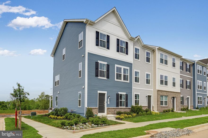 ESTIMATED DELIVERY: MAY 2025!
New end unit Lancaster model in the highly sought-after Shenandoah Springs community, Ranson WV.  The impeccably designed Lancaster presents stunning exterior with beautiful landscaping and 2-car rear garage. On the ground level, there is a recreation room plus half bath for easy entertaining. Upstairs, a large 10x18 foot deck is situated off the modern and functional rear kitchen, plus an immense Great Room ready for entertainment.  The kitchen is suited with premium stainless-steel appliances, Valle Nevado granite countertops, and Barnett Duraform  cabinets in Linen. The third level has three generously sized bedrooms, which offer great flexibility in how to utilize the space as both the second and third bedrooms could easily be used as an office! Washer and Dryer included with home! This home includes the upgraded third floor 2' extension. 

Future amenities include a swimming pool, picnic area, trails, and a park with a basketball court, tot lot, and gazebo. Commuters will appreciate easy access to the bustling Northern Virginia, Baltimore-Washington, D.C. area. Call today for more information!

*Pictures are of a similar home and for illustrative purposes only. Pricing and incentives are subject to change without notice.