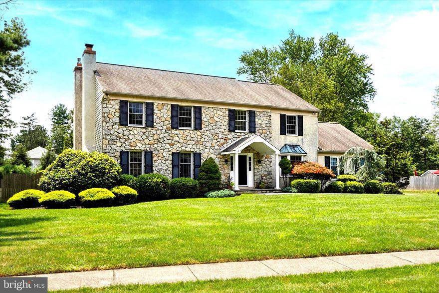 Welcome to 1010 Pheasant Meadow Road—a beautifully appointed traditional home set on nearly an acre in the heart of Blue Bell. With mature trees, lush landscaping, and classic curb appeal, this property immediately creates the sense of a private retreat.
Inside, a gracious foyer welcomes you with rich hardwood floors that extend throughout the main level. To one side, the formal dining room makes a memorable impression with its bay window, wainscoting, and crown molding—an elegant setting for entertaining. Opposite, the formal sitting room showcases custom millwork and a wood-burning fireplace with a marble hearth, creating a refined space to relax with guests.
The home then flows into an expansive living area anchored by the family room, where cherry wood built-ins, a gas fireplace framed in millwork, and another bay window overlooking the EP Henry covered patio combine to create a warm and inviting atmosphere.
At the heart of the home is the chef’s dream kitchen. Designed for both form and function, it features top-tier stainless steel appliances including a Wolf stove, Viking double ovens, trash compactor, beverage fridge, and built-in wine rack. A crisp subway glass tile backsplash ties the space together. The two-tiered granite island provides prep space on one level and casual seating on the other, while an additional prep island with a sink is conveniently placed near the ovens. Abundant cabinetry, custom lighting, and a soaring Palladian window—offering breathtaking backyard views—make this kitchen a standout. A sliding French door connects the kitchen to the covered patio with three skylights, perfect for outdoor dining and entertaining.
The first floor also includes a laundry room with sink, a stylish powder room, and access to an oversized two-car garage with storage or workshop potential.
Upstairs, the spacious landing leads to the luxurious primary suite. This retreat offers a versatile bonus room with custom built-ins—ideal for a home office, nursery, or gym—along with two walk-in closets, an additional storage area, and an en-suite bath with double vanity. Three generously sized bedrooms with ample closets and a neutral hall bath complete the upper level.
The unfinished basement provides excellent storage and can be finished to suit your needs. Outside, the backyard unfolds as a true sanctuary: an expansive patio, beautifully landscaped grounds, and a sparkling pool with an integrated spa—all set in complete privacy. Whether lounging poolside, hosting a barbecue, or enjoying music through the home’s built-in sound system, this outdoor space is designed for relaxation and fun.
Located in the award-winning Wissahickon School District and minutes from Routes 202, 309, the PA Turnpike, and the Blue Route, this home blends convenience with tranquility. Schedule your private showing today.