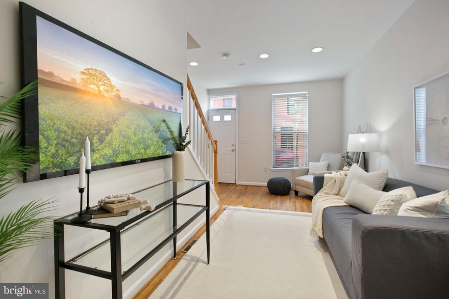 Welcome home to 13 N. Streeper St! This charming 2 bedroom, 2.5 bath rowhome offers it all! As you enter through the front door you will be greeted into the beautiful living room. Straight ahead you will find the dining area leading directly into the kitchen. The kitchen features stainless steel appliances and plenty of countertop space! A private enclosed patio sits directly off of the kitchen, perfect for entertaining or even a POTENTIAL PARKING PAD! The main level also features hardwood floors, a half bathroom and laundry. Upstairs will lead you to two bedrooms, both with en-suite bathrooms. The basement is unfinished yet perfect for plenty of storage. Being just steps away from Patterson Park, this location cannot be beat! Schedule your private showing today!