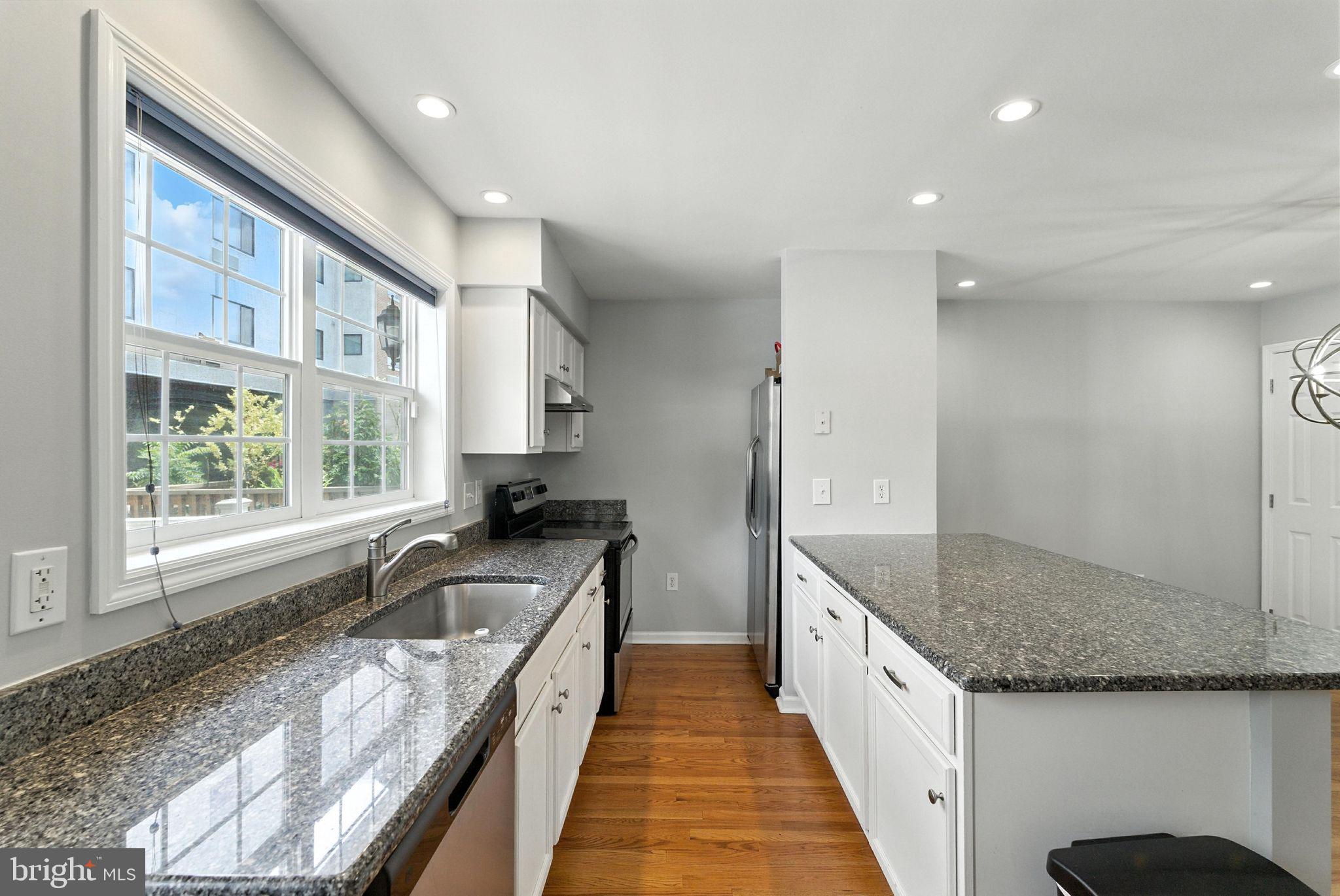 Oversized 1-car garage and off-street parking in this rare 3 bedroom/3.5 bath Roxborough/Manayunk home! Upgrades include granite kitchen counters with extra-large stainless steel sink and updated faucet. Upgraded lighting including 12 recessed lights. Complete with stainless steel appliances and real wood floors flowing seamlessly between the kitchen, dining, and living areas. Private deck conveniently located right outside kitchen. Family room and first floor full bathroom have LVP Flooring. Master bathroom has been updated with subway tile shower, light fixture, sink and faucet. All freshly painted in a neutral contemporary color to match any home furnishings. Low maintenance exterior landscaping. Contact your agent to schedule your private showing today!