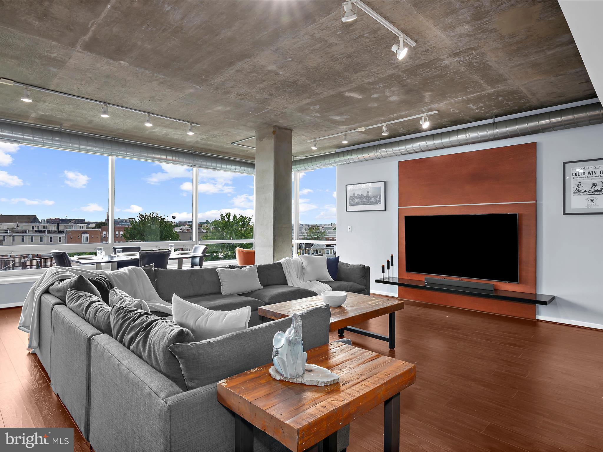 Welcome to the largest one-bedroom, one-and-a-half-bath residence at Silo Point. This spacious 1,590 square foot corner unit offers unmatched privacy, abundant natural light, and sweeping panoramic views stretching from north to west and south. Enjoy stunning sunsets, city skyline vistas, cruise ship activity, and seasonal fireworks all from the comfort of your living space.
The gourmet kitchen is thoughtfully appointed with a 2025 Whirlpool French-door refrigerator and freezer, a Frigidaire microwave, stove, and dishwasher (all new in 2022). Updated countertops, a new sink, and faucet, and a striking waterfall-edge island create a modern, functional focal point. Upgraded wood flooring and new carpet installed in December 2024 add warmth and refinement throughout.
The spacious primary suite features a walk-in closet and a spa-style bathroom with dual vanities, new faucets, a soaking tub, and a separate glass-enclosed shower. Both the primary and guest bathrooms have been updated with new toilets for added comfort and efficiency.
Additional features include in-unit laundry, two deeded garage parking spaces, and generous storage throughout.
Silo Point residents enjoy a full suite of amenities, including a state-of-the-art fitness center, yoga studio, game and conference rooms, and the exclusive 19th-floor Sky Lounge with breathtaking harbor and city views. The building also offers 24-hour front desk service, secure entry, bike storage, and a pet-friendly atmosphere.
Located in the heart of Locust Point near Fort McHenry and the Baltimore Peninsula, Silo Point offers convenient access to commuter routes, water taxi stops, public transportation, and major highways. Downtown Baltimore, Federal Hill, Camden Yards, and an array of dining, retail, and parks are all nearby. BWI Airport is less than 20 minutes away, offering easy access to Washington, D.C.
This home presents a rare opportunity to enjoy generous square footage, modern updates, and a front-row seat to Baltimore’s waterfront and skyline.