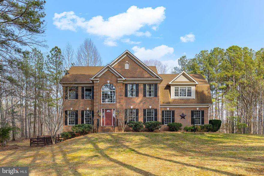 Welcome to your dream home nestled in the charming SEVEN LAKE equestrian community! This wonderful Colonial-style residence, offers a perfect blend of comfort and elegance across its spacious 5-bedroom, 3.5-bath layout. As you step inside, you’ll be greeted by an inviting floor plan that seamlessly connects the family room to the kitchen, making it ideal for gatherings and entertaining. The kitchen boasts , and ample table space, ensuring culinary adventures are a delight. The interior features are designed for modern living, with beautiful wood floors, crown moldings, and recessed lighting that create a warm ambiance throughout. Cozy up by the wood-burning fireplace in the family room, or enjoy the convenience of an upper-floor laundry area. Step outside to your expansive 3.13-acre lot, partly wooded for added privacy, where you can unwind on the deck or patio while soaking in serene views of the yard and surrounding trees. The community amenities, including horse trails, a playground, pond with fishing and a picnic area. With a side-entry attached garage and a security system for peace of mind, this home is not just a place to live, but a sanctuary to thrive. Don’t miss the chance to make this inviting property your own—schedule a tour today and experience the perfect blend of comfort and nature!