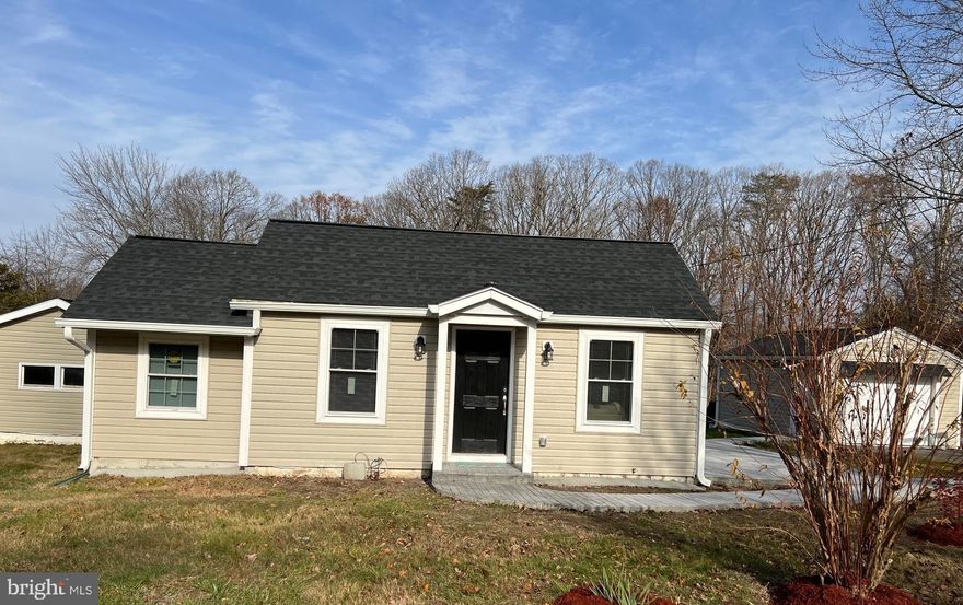 DEADLINE FOR ALL OFFERS DUE BY 7:30 PM ON 01/30/2024  
Discover the epitome of modern living in this meticulously renovated one-level home. Boasting an open concept, 2 bedrooms, plus a versatile flex room ideal for a bedroom or office, every detail exudes contemporary elegance. Unveiling a complete transformation in 2023, this home features a new roof, gutters, siding, windows, insulation, plumbing, electrical panel, wiring, HVAC with ducts, water heater, and high-end flooring. The kitchen showcases brand-new appliances, while the bathrooms exude luxury.

Entertain seamlessly on the stamped concrete patio, and savor morning tranquility on the private deck off the owner's bedroom. The separate garage, insulated with remote control access, alongside a spacious shed and smaller storage shed, offers three structures for your convenience. With ample parking for 6+ vehicles, and located on an expansive flat lot of nearly 1 acre in a prime location with schools within walking distance, seize the opportunity to call this renovated ranch your dream home.