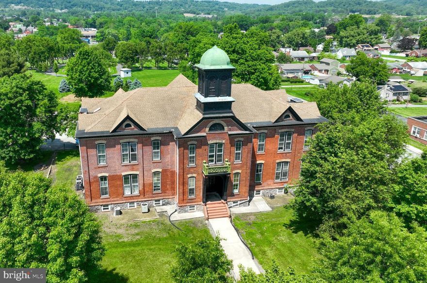 Welcome to unit 11 at the Manor School Apartments in Columbia, PA.  This is a one bedroom, one bathroom unit that's roughly 950 square feet located on the second floor.  Tenants will enjoy many updates such as the newly renovated kitchen, bathroom, natural light coming in from the large windows, high ceilings, new carpet, and fresh paint throughout.  There are standard sized common area coin-operated washers and dryers.  Tenant gets one designated parking spot, while the rest of the lot is first come, first serve.  Conveniently located near dining, shopping, route 462, and Highway 30, this is a move-in ready rental. Pets are welcome but restrictions apply. Apply today!