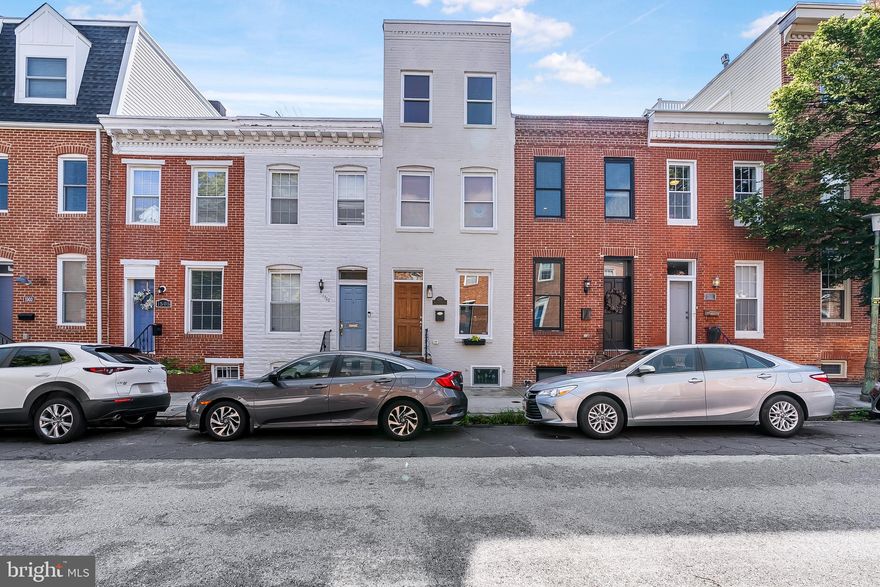 PREMIER OPPORTUNITY AWAITS THE CHOOSIEST OF HOME DWELLERS.  ENJOY A LEISURELY STROLL OFF THIS PARK SETTING NEIGHBORHOOD ONTO ONE OF BALTIMORE'S MOST STUNNING BLOCKS.  ENJOY A LARGE HOME WITH MODERN DAY HIGH END AMENITIES  MIXED IN PERFECTLY WITH KEY HISTORIC ELEMENTS.  RELAX IN CITY LIVING AMONGST EXPOSED BRICK AND GLISTENING HARDWOODS THROUGHOUT.   YOU WILL ENJOY THE MOST VIP EXPERIENCE WITH LARGE GARAGE OFF REAR FOR ONE VEHICLE.  THREE BEDROOMS ARE ALL EASILY FURNISHABLE.   LARGE KITCHEN OFFERS AN EAT IN EXPERIENCE.  PERFECT FOR ALL RESIDENTIAL NEEDS- GREAT PUBLIC SCHOOL IN THE AREA, QUICK ACCESS TO 95 AND DOWNTOWN BUSINESS.  STROLL OVER TO THE HARBOR WHILE DIVING INTO THE BEST OF RESTAURANTS & NIGHT LIFE.   READY FOR JULY MOVE IN